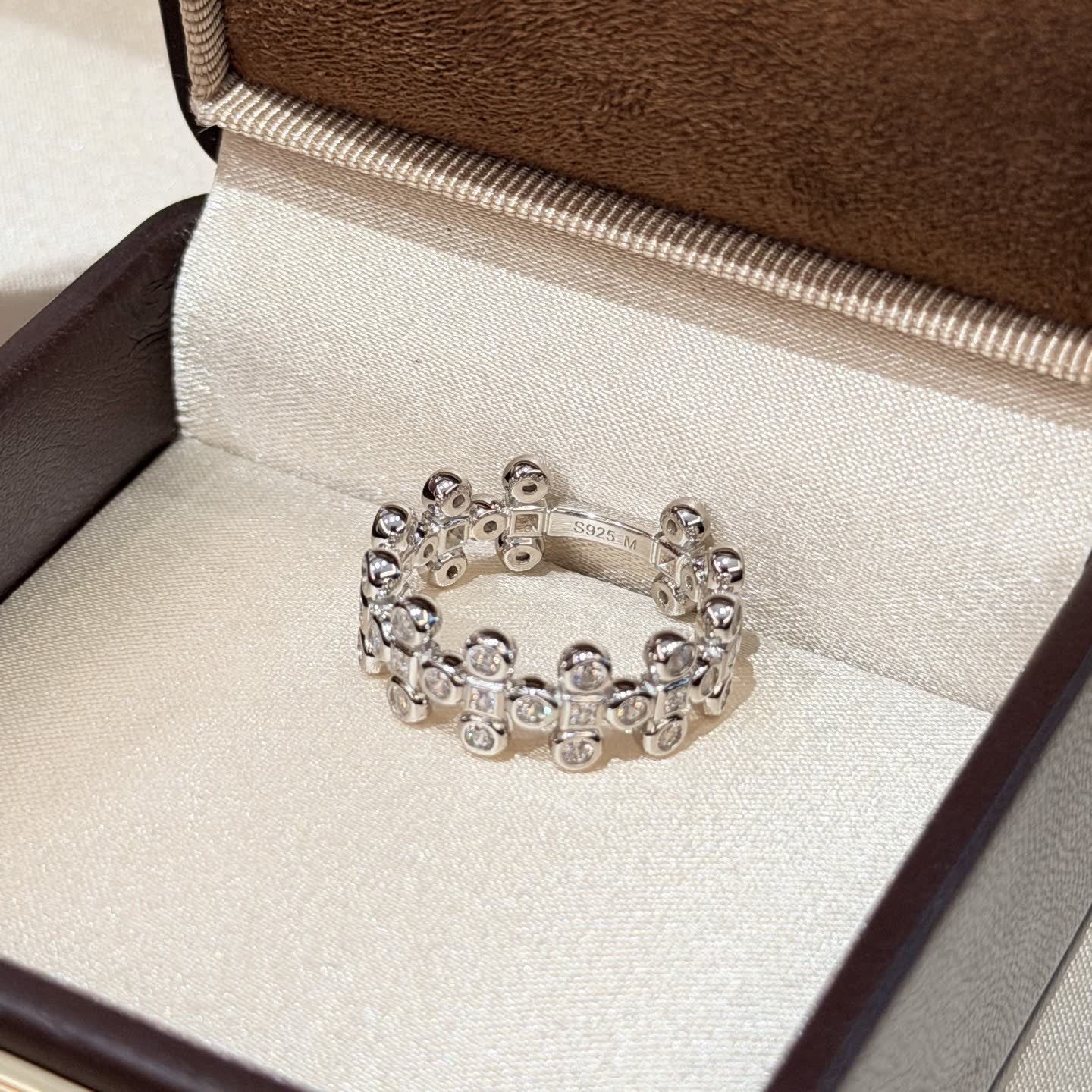 Van Cleef & Arpels Elegant Silver Ring with Cubic Zirconia Stones